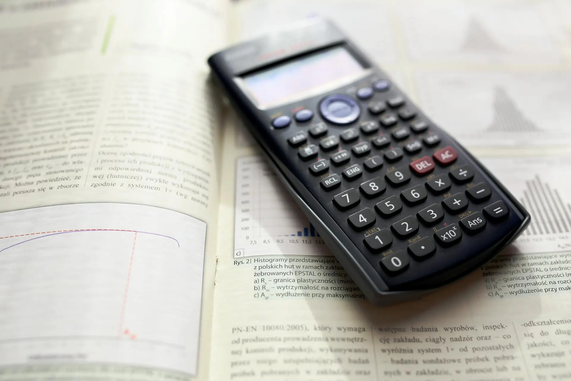 Mathematics textbook and scientific calculator